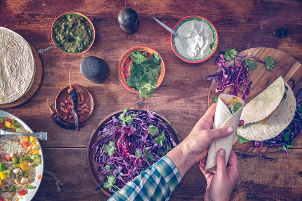 istock Preparing Fish Tortilla Sandwich with Vegetables 641388008