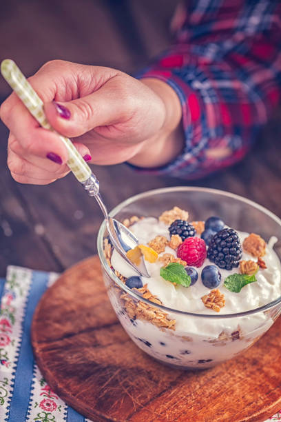 istock Yogurt with Fresh Berries and Cereals 641388558