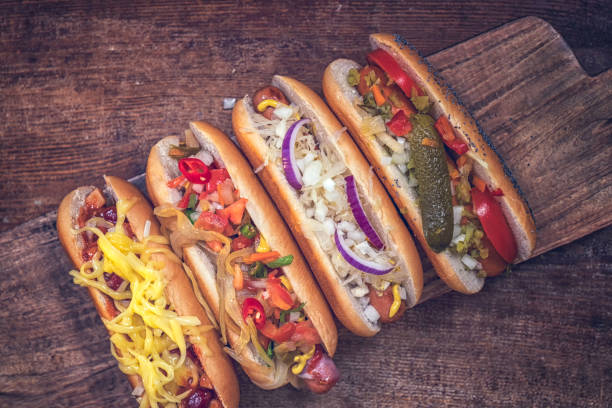 istock Hot Dog Variation on Wooden Board 641391196