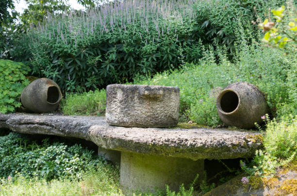 istock twee big concrete vases in garden 641394608