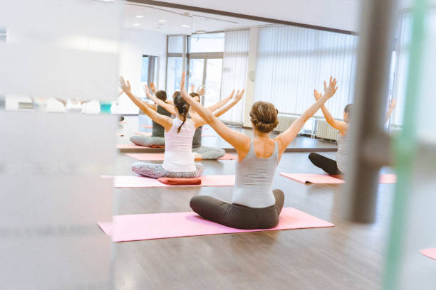istock Pregnant women on a yoga class 641395972