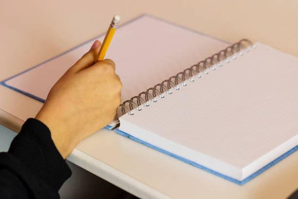 istock Teenage girl doing homework for school 641396404