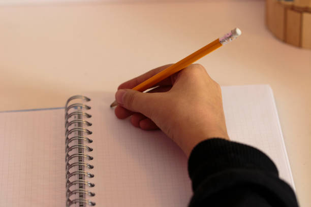 istock Teenage girl doing homework for school 641396424