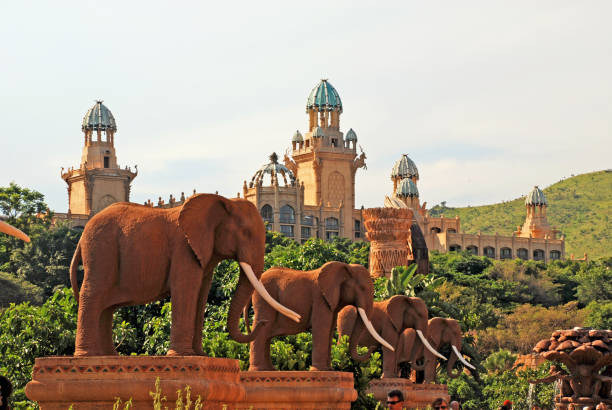 elephant statues on Bridge of Time, Sun City, South Africa Gigantic elephant statues on Bridge of Time in famous resort Lost City in Sun City, South Africa. elephant figurine stock pictures, royalty-free photos & images