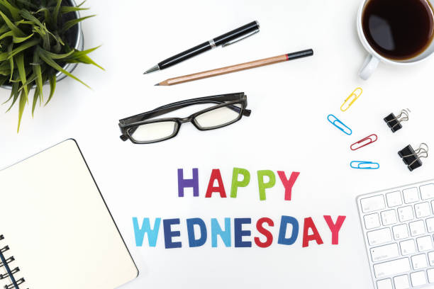 istock Office desk table with happy wednesday word 641398462