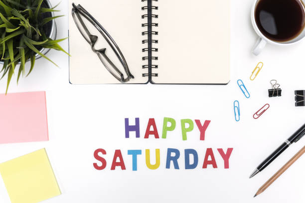 istock Office desk table with happy saturday word 641398466
