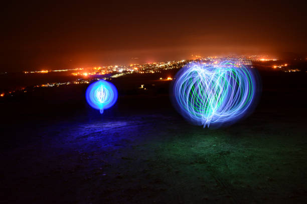 istock Orbs, Trails and Town Lights. 641398994