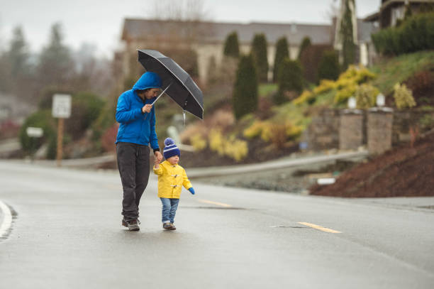 istock Family Walk in the Rain 641399040