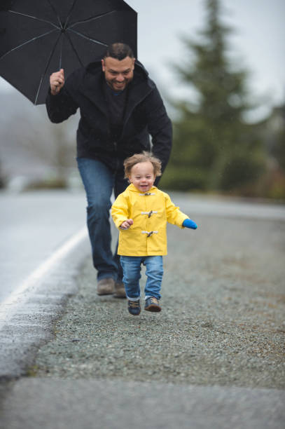 istock Family Walk in the Rain 641399042