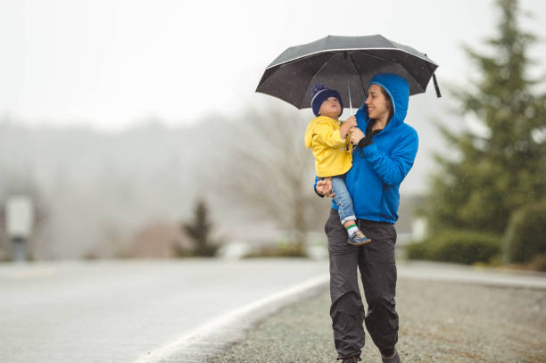 istock Family Walk in the Rain 641399060