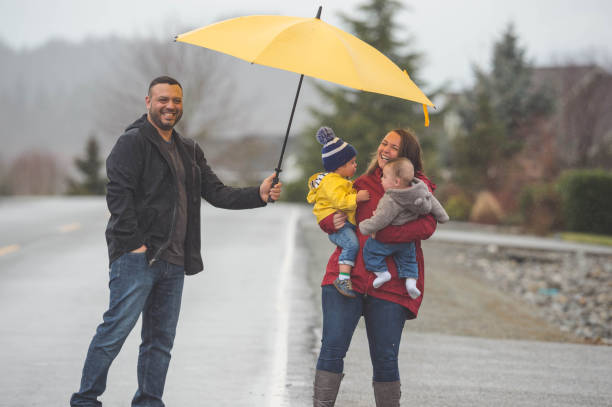 istock Family Walk in the Rain 641399062