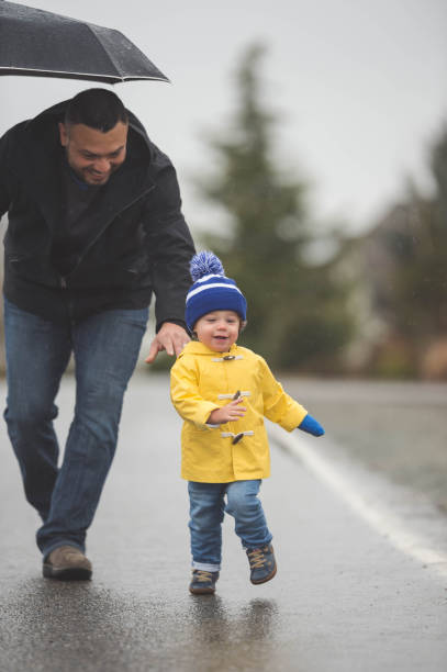 istock Family Walk in the Rain 641399070