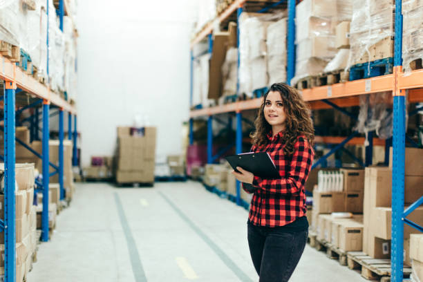 istock Woman working at a warehouse 641400052