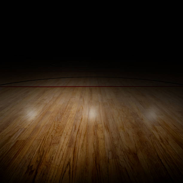 Dramatically Lit Basketball Arena and Copy Space