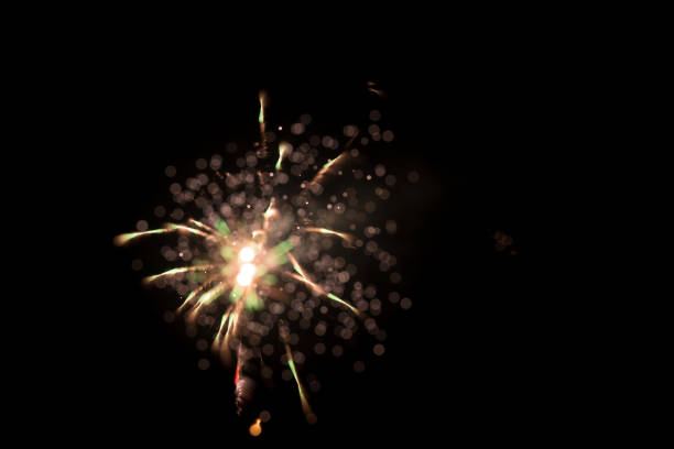 istock fireworks in the black sky with long trail 641405326
