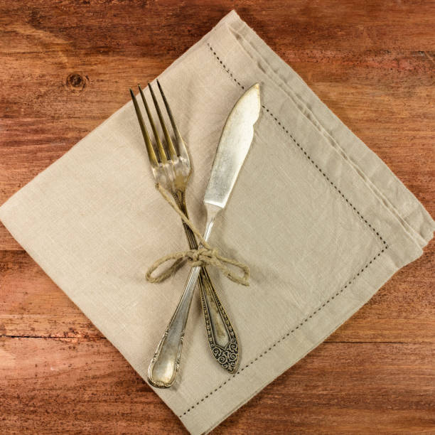 istock Vintage fork and knife on wooden background 641408318