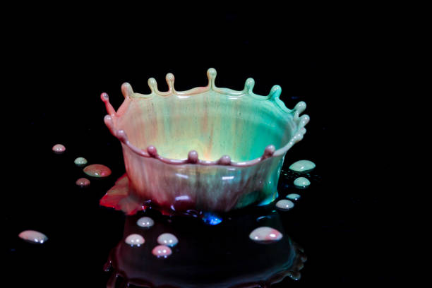 istock The study of a liquid drop creating shapes 641409900