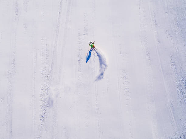 istock skier aerial drone perspective 641412416