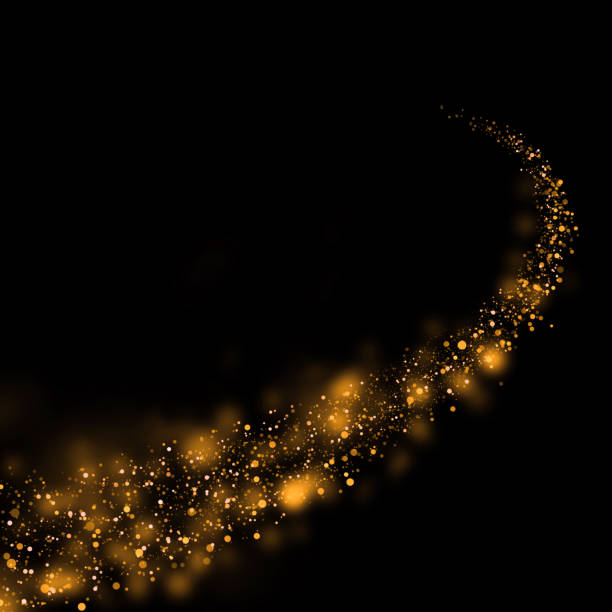 istock glittering stars dust trail and bokeh background.Magic abstract element for your product. 641414200