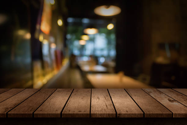 Blur coffee shop or cafe restaurant with abstract bokeh light background. For create montage product display