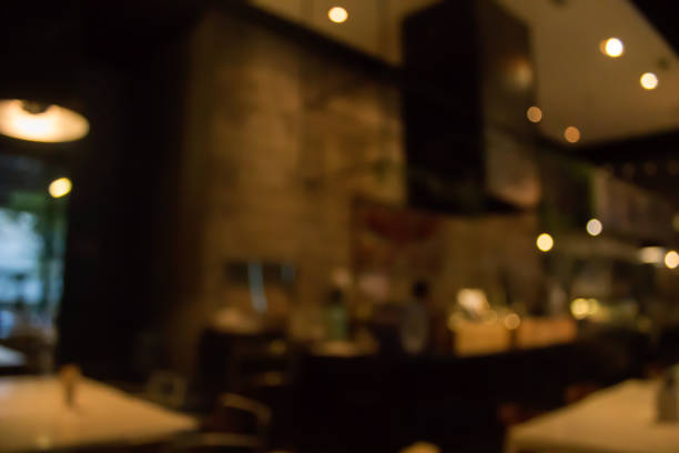 istock Blur coffee shop or cafe restaurant with abstract bokeh light image background 641414666