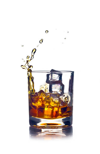 istock splash in a glass of whiskey 641415418