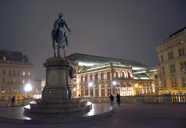 opera and statue in Vienna Austria in night