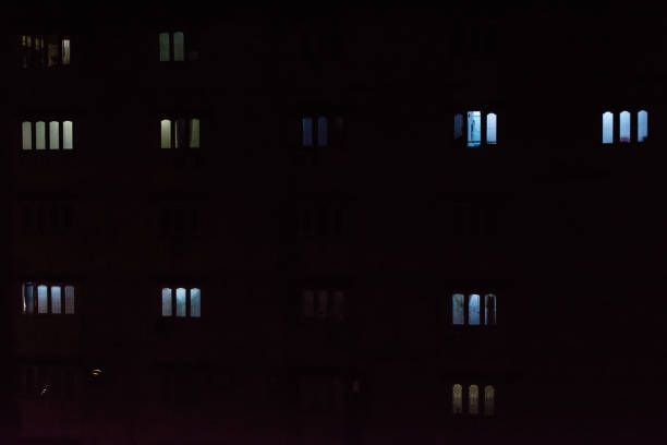 istock Dim lights from apartment windows at night in Yangon 2 641424124