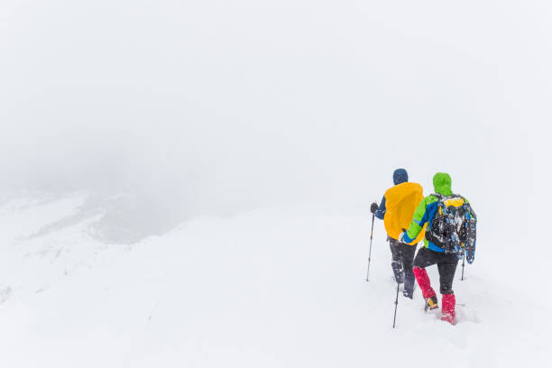 istock Mountaineers on snowy path during snowstorm 641427216
