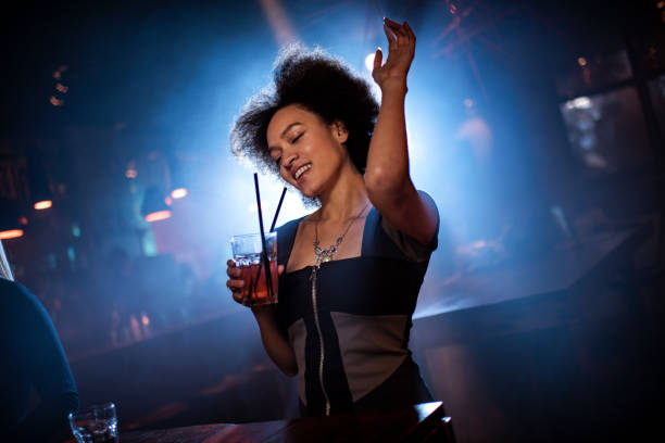 istock Woman dancing in the club 641431934