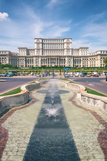 A view of the Palace of the Parliament, the seat of the parliament of Romania, from Unirii Boulevard near Piata Constitutiei (Constitution Square).