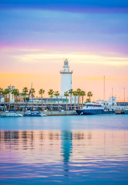 The Marine of Malaga The marine of Malaga, Spain. It is a modern region of the city with museums, restaurants, entertainment, and a ancient lighthouse at the tip. malaga spain stock pictures, royalty-free photos & images