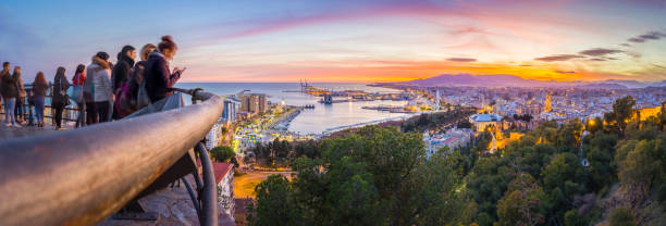 Malaga from the Mountains Malaga, Spain - January 2017: Malaga from above. The best view point of the city is located at the mountains close by. From there you are able to see the whole historic center. seville port stock pictures, royalty-free photos & images