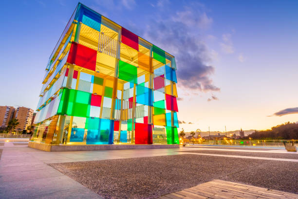 Malaga, Spain - January 2017: El Cubo, a cuboid glass structure in Malaga port. The marine of Malaga is the modern and dynamic part of the city with museums, exhibition spaces, restaurants and bars, making of Malaga one of the most interesting cities in south Europe.