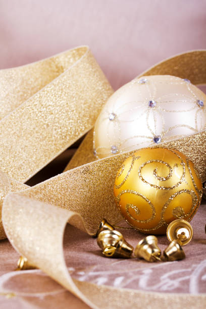 istock Festive gold Christmas decorations on fabric background 641439698