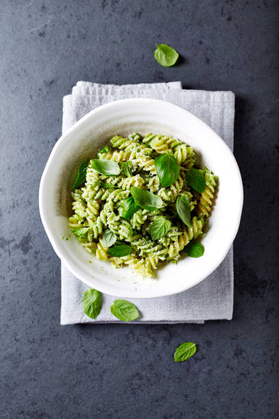 istock Pasta with basil pesto and fresh basil leaves 641443428