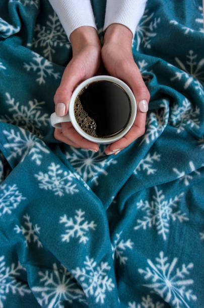 istock holding a cup of coffee 641443548
