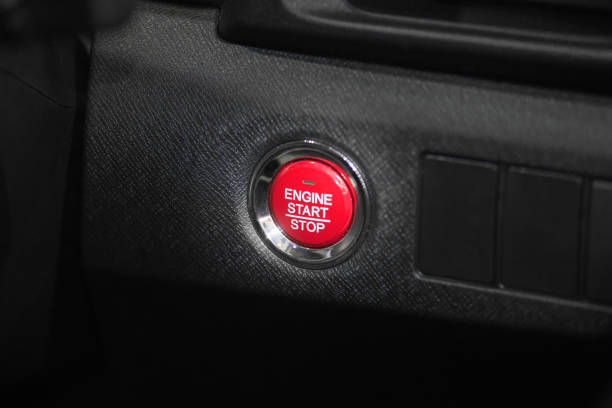 istock Detail close up of red engine start stop car button 641443734