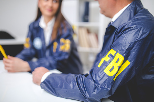 Woman and Man ,Senior and adult,FBI woking on case