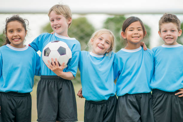 istock Friends Playing a Soccer Game 641444836