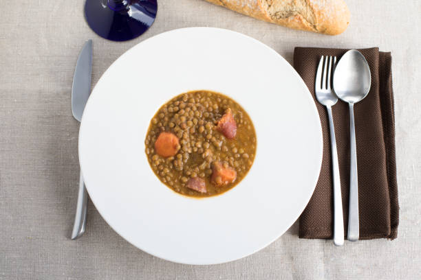aerial view of lentils stew in white dish stock photo