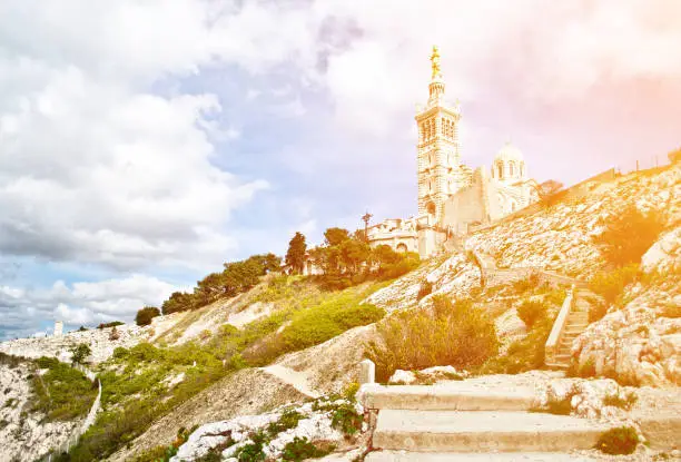 Notre-Dame de la Garde (literally Our Lady of the Guard), is a basilica in Marseille, France. This ornate Neo-Byzantine church is situated at the highest natural point in Marseille.