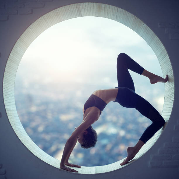 istock Young woman doing yoga 641448972