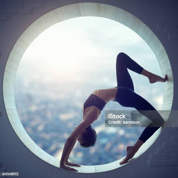 Young Woman Doing Yoga Stock Photo - Download Image Now - Flexibility, Yoga, Gymnastics