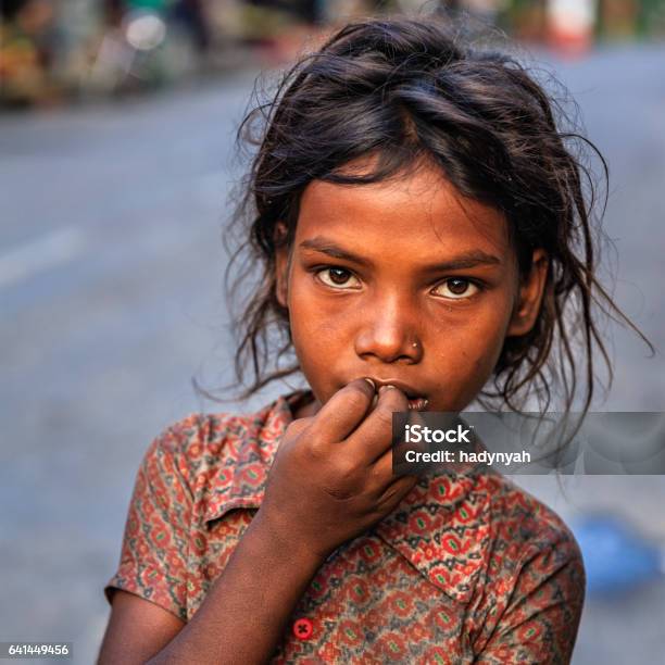 Poor Indian Girl Asking For Help Stock Photo - Download Image Now - Poverty, India, Child