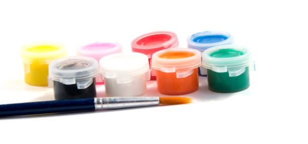 istock Brushes and paints to paint spread out isolated on white background. 641453356