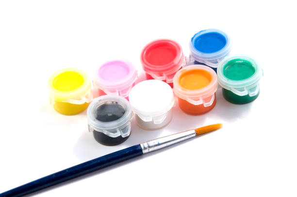 istock Brushes and paints to paint spread out isolated on white background. 641453388
