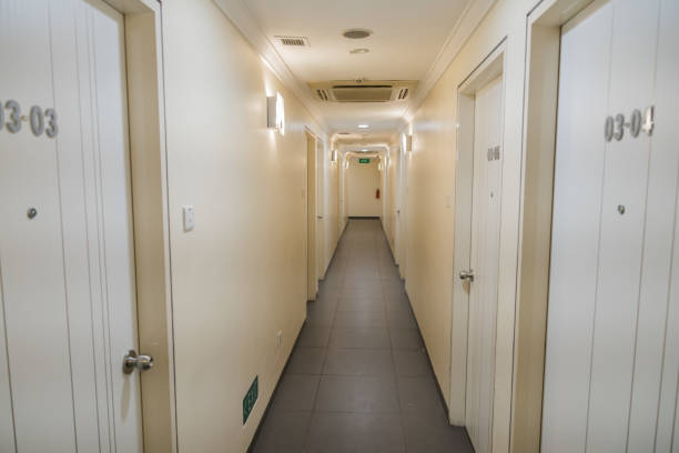 istock Corridor with closed doors in office residential building or hotel 641454660