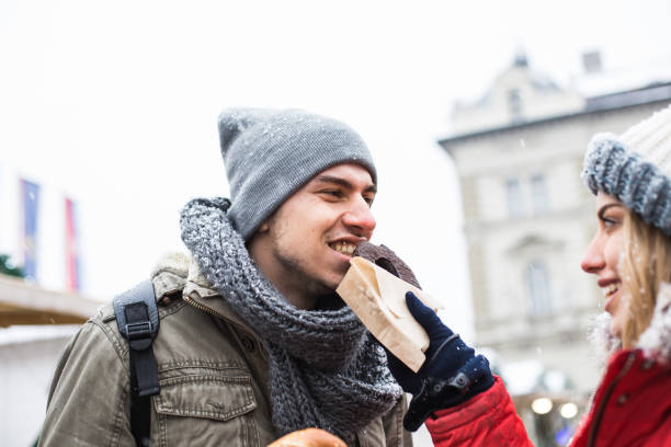 istock Eating chocolate donut together in the city 641455120