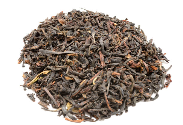 istock Heap of tea on white background 641455224